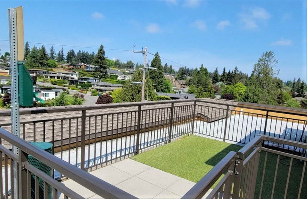 Lux Apartments Bellevue WA Rooftop pet run with pet station Lux Apartments Bellevue WA Rooftop pet run with pet station